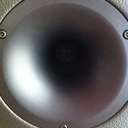 Compression driver for the tweeter.  Check out the leather front!