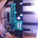 The external Lingo power supply's interface board inside the plinth is treated with damping tape