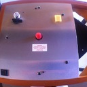 signature anniversary edition Linn Sondek LP12 in the setup jig, bottom and armboard removed, bearing cap in place.