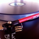 F-dot-cross tonearm by the Funk Firm headshell assembly is slotted to give the proper angle on the cartridge mount.