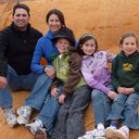 This is my family visiting Crystal Geyser in Southern Utah last April.  We're sitting on a shelf of minerals that has covered the landscape thanks to years of the geyser spewing it's watery goodness into the air.
